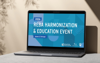 An open laptop that shows an opening slide in a presentation for the REBA Harmonization and Education Event 2026, held on June 4. The Clinical Trials British Columbia, Interior Health and UBC logos are shown on the slide. Behind the laptop is a beige wall with natural light.